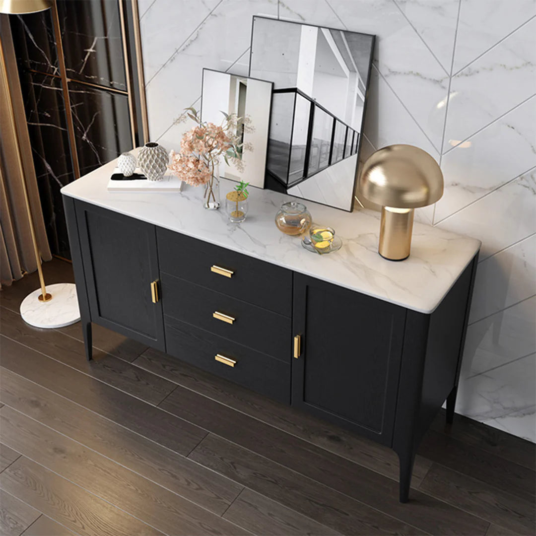 Black sideboard with marble top in a modern interior.