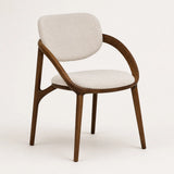 Florence upholstered dining chair with tapered wooden legs, low-angle view