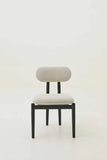 Chair with a gray cushioned backrest and seat on a white background