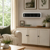 A wall-mounted portable air conditioner or fan unit in white and black, installed above a wooden credenza in a styled living room setting.