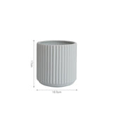 Short grey cylindrical vase with vertical ribbing, measuring 17cm in height and 16.5cm in diameter.