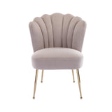 Front view of the Elara Velvet Dining Chair, displaying the plush velvet upholstery, shell-like backrest, and elegant gold legs.