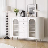 White Elizabeth Glass Sideboard Cabinet in a Bright Room - Elegant white sideboard cabinet with glass doors, placed in a well-lit room with a coffee maker on top.