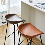 Hackney Industrial Leather Bar Stool in rich tan, blending modern industrial aesthetics with ergonomic comfort.