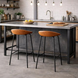 Leather bar stool UK with black metal frame at industrial kitchen island