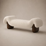 Close-up of the Haven cream boucle bench showing textured upholstery and dark wood legs