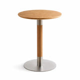 Round wood-finish pedestal coffee table with stainless steel base on white studio background