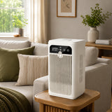 Portable mini air cooler fan on wooden side table in bright modern living room