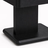 Matt black ash wood base detail of the Maidstone luxury bedside table with visible natural wood grain.
