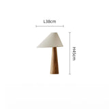 Maple Oak Haven Wooden Table Lamp, showing a sleek wooden base and a fabric shade. Dimensions: 38cm in length and 45cm in height, suitable for cozy interior settings