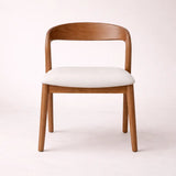 Front view of upholstered dining chair with minimalist Scandinavian design