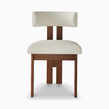 Front view of the Mid-century Sunbury Bouclé Dining Chair with a walnut wood frame and cream upholstered seat and backrest, showcasing its minimalist yet sophisticated design.