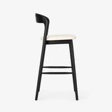 Bar stool with black frame and white seat on a white background