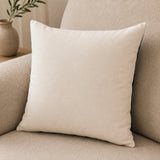 Back view of the Polka Dot Tufted Cushion showing the plain natural cotton reverse