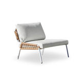 Modern two-seater garden sofa with a sleek silver frame and woven rattan sides, cushioned with thick white pads for comfort, ideal for contemporary outdoor lounging.