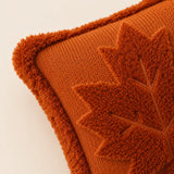 Side view of orange Halloween cushion with plush border, perfect cushion for sofa and bedroom décor