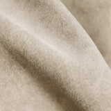 he texture appears smooth and velvety, indicating a plush and comfortable material. The fabric has a slightly fuzzy, suede-like appearance, which suggests it is designed to be durable and possibly cat-friendly, making it suitable for pet owners.