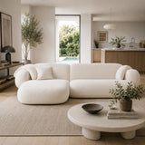White Tofu sofa in an elegant UK-inspired living room with archway, light wood flooring, neutral rug and soft modern styling.