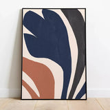 Whispering Waves Canvas Wall Art displays flowing abstract shapes in navy, white, and terra cotta, evoking a sense of oceanic movement and tranquility, positioned above a modern wooden cabinet in a minimalist room setup.