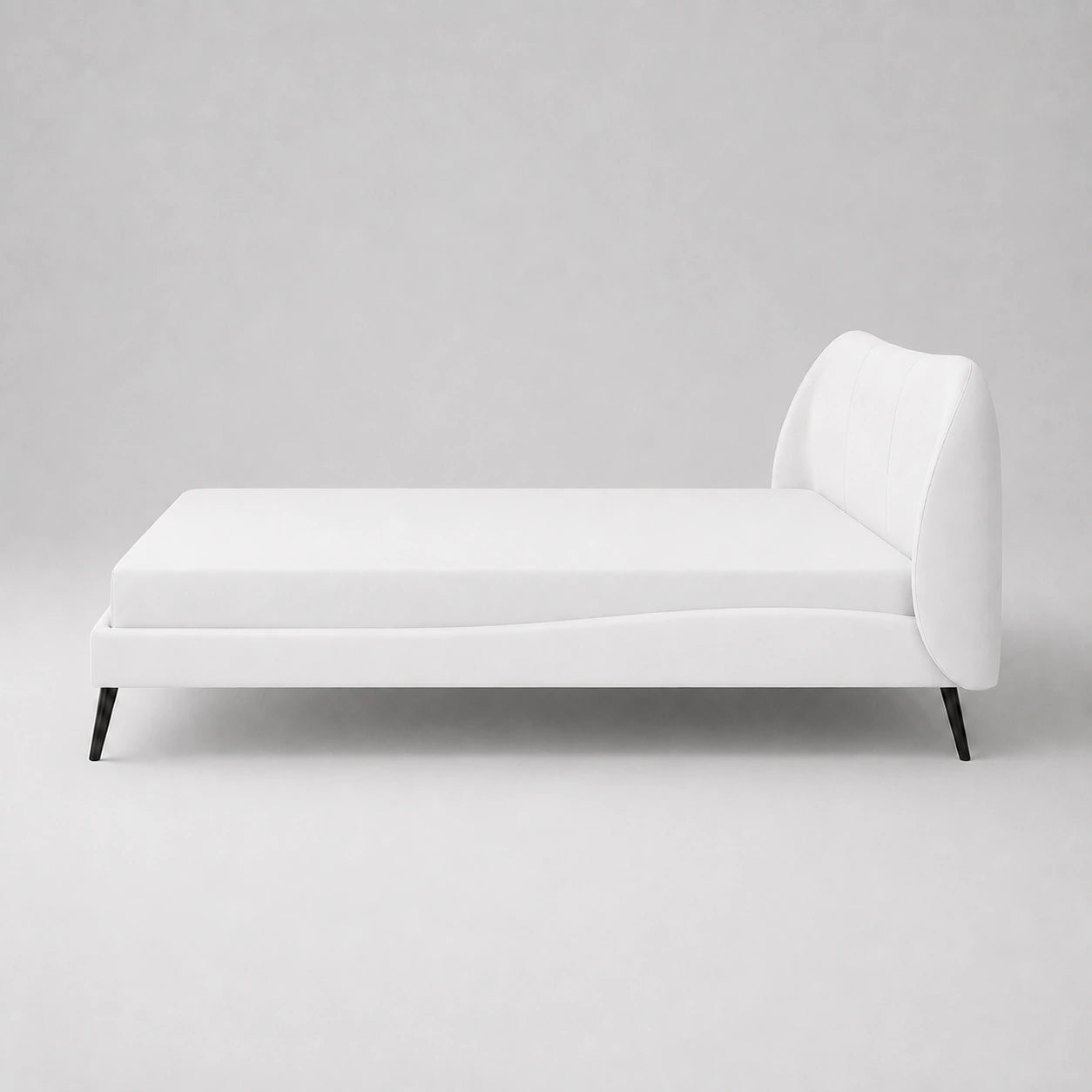 Front view of a white super king size bed frame with softly curved panelled headboard and black metal legs