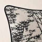 Close-up of black piping and textured cream fabric on the Woodland Cushion