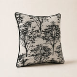 Three-quarter side view of the black and cream Woodland Cushion