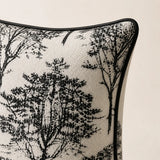 Woodland Cushion corner detail showing the black tree print and piped edge