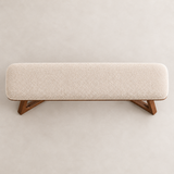 Top view of the Mid-Century Northwood bench showing cream textured upholstery and sculptural wooden legs